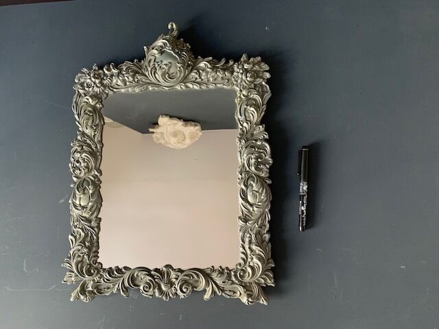 Antique Italian mirror in repoussé silver metal