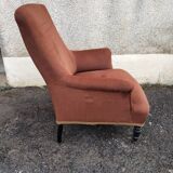 Antique brown velvet tub chair – turned legs and brass rings.