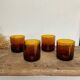 8 mismatched vintage amber glasses