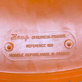 Orange tam-tam by Stamp with integrated pocket.