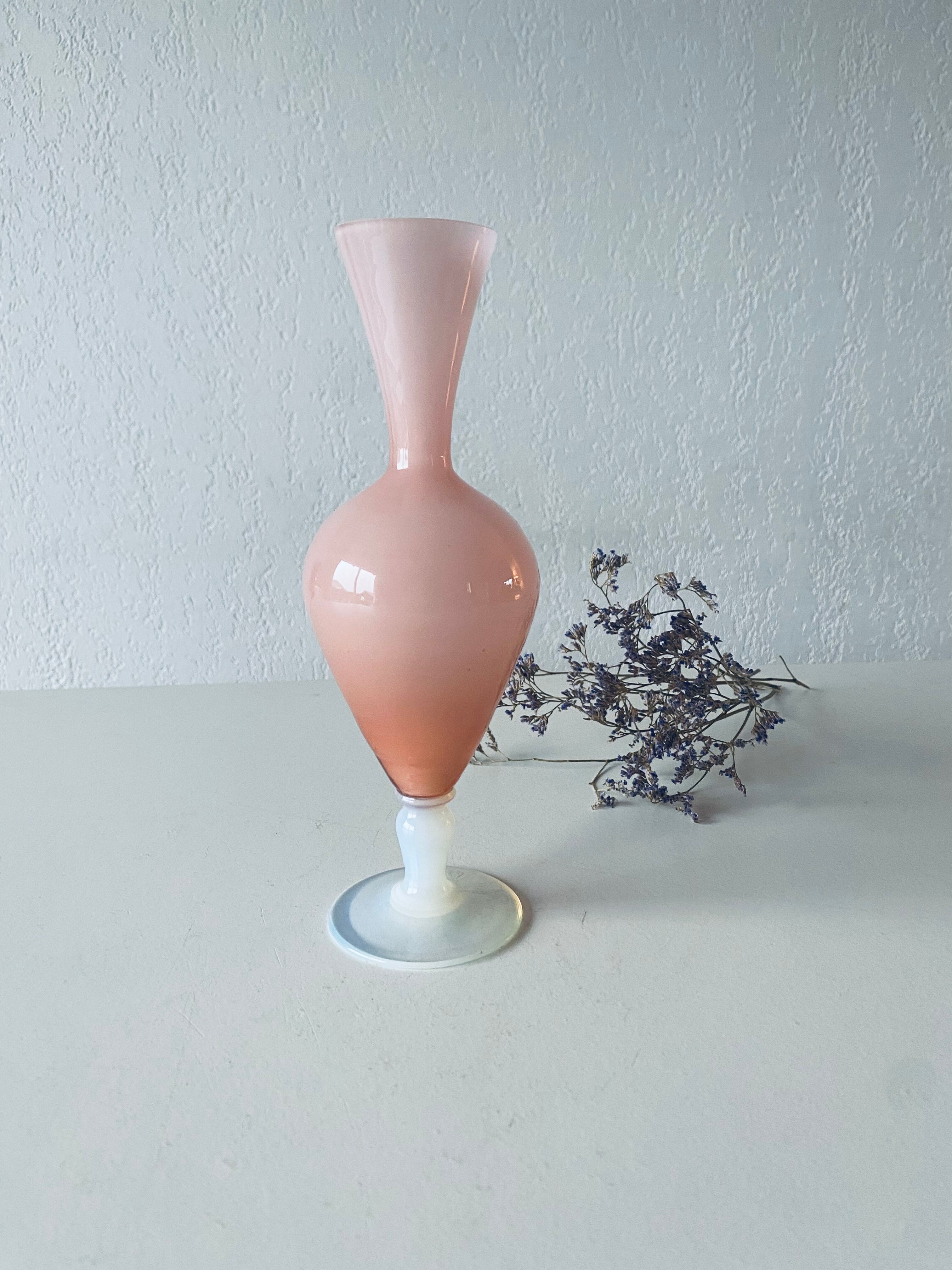 Old vase in pink opaline