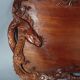 Ancient wooden tray carved with Chinese dragons around 1900