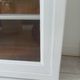 Showcase, bookcase, dresser style louis philippe patinated pearl gray, 2 glass doors.
