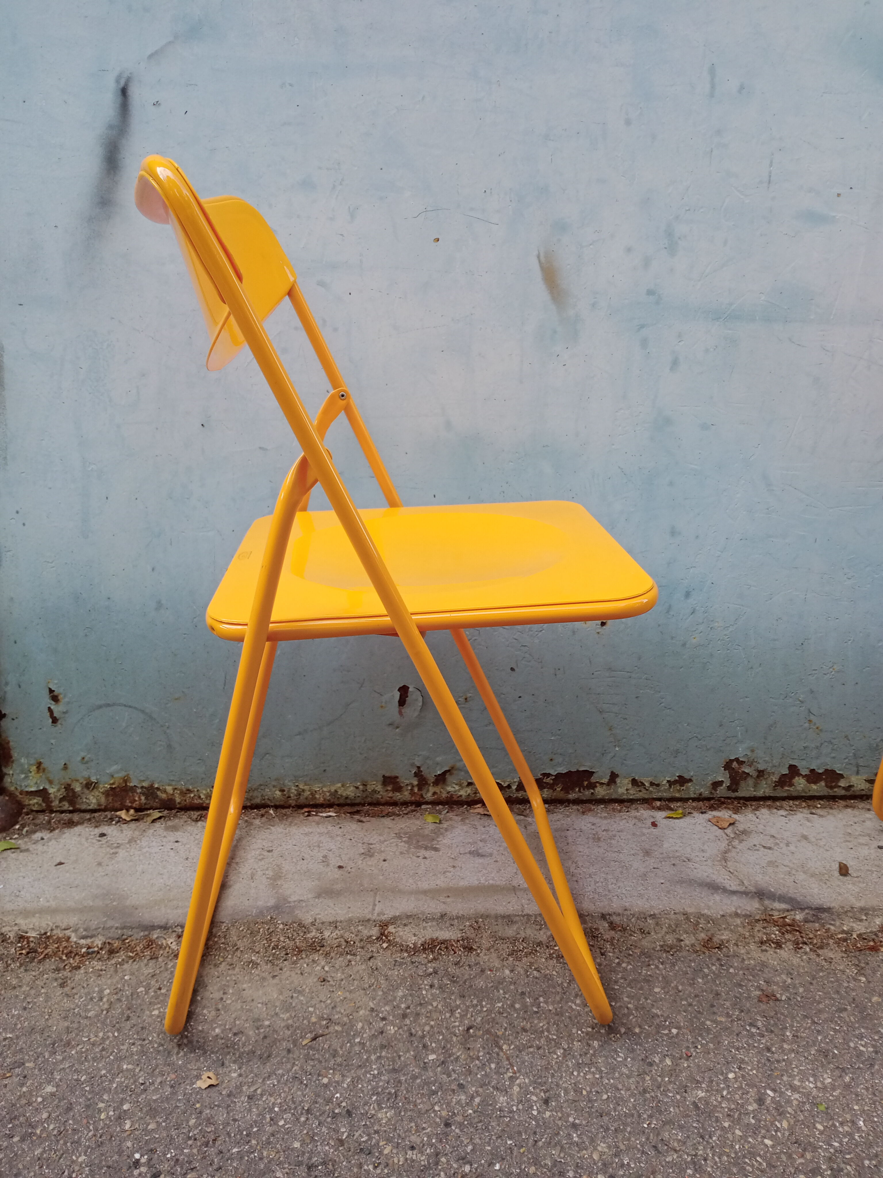 Orange vintage folding chairs