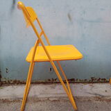 Orange vintage folding chairs