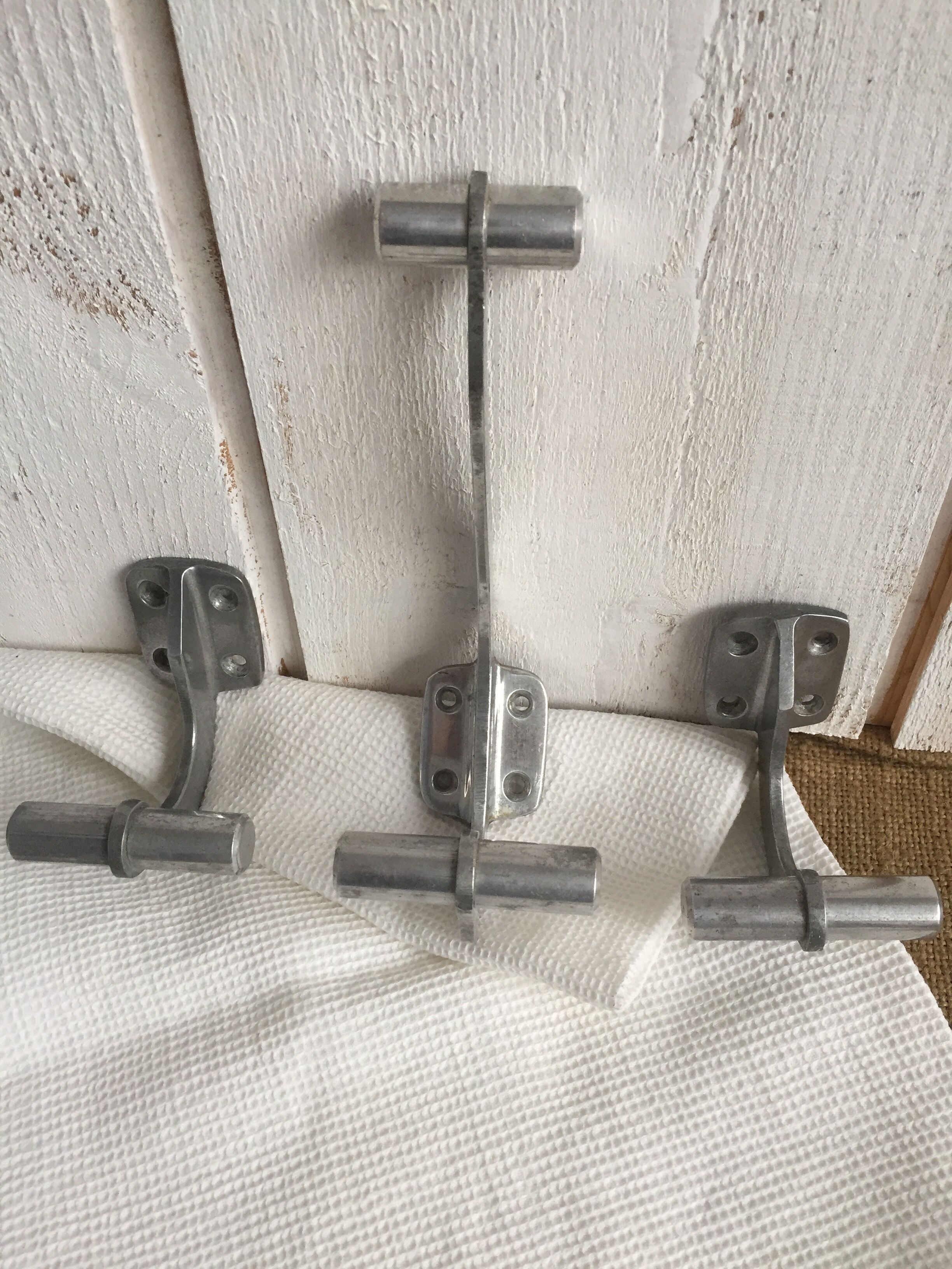 Trio of hooks art deco