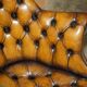 Fauteuil Chesterfield directeur ou capitaine Art Déco en cuir restauré