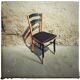 Set of mismatched bistro chairs