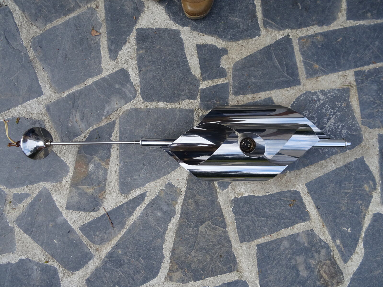 Hanging space age stainless steel