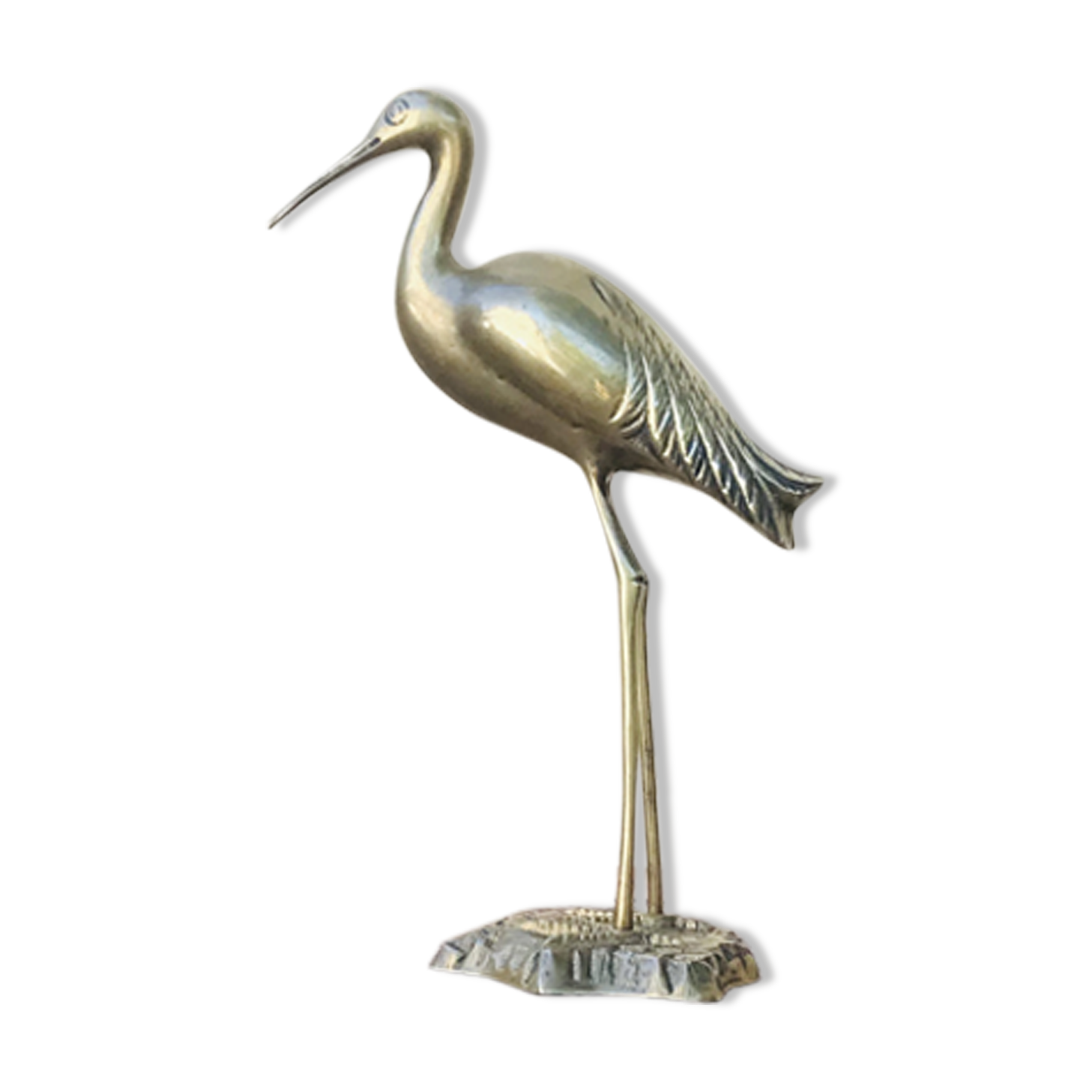 Heron in brass