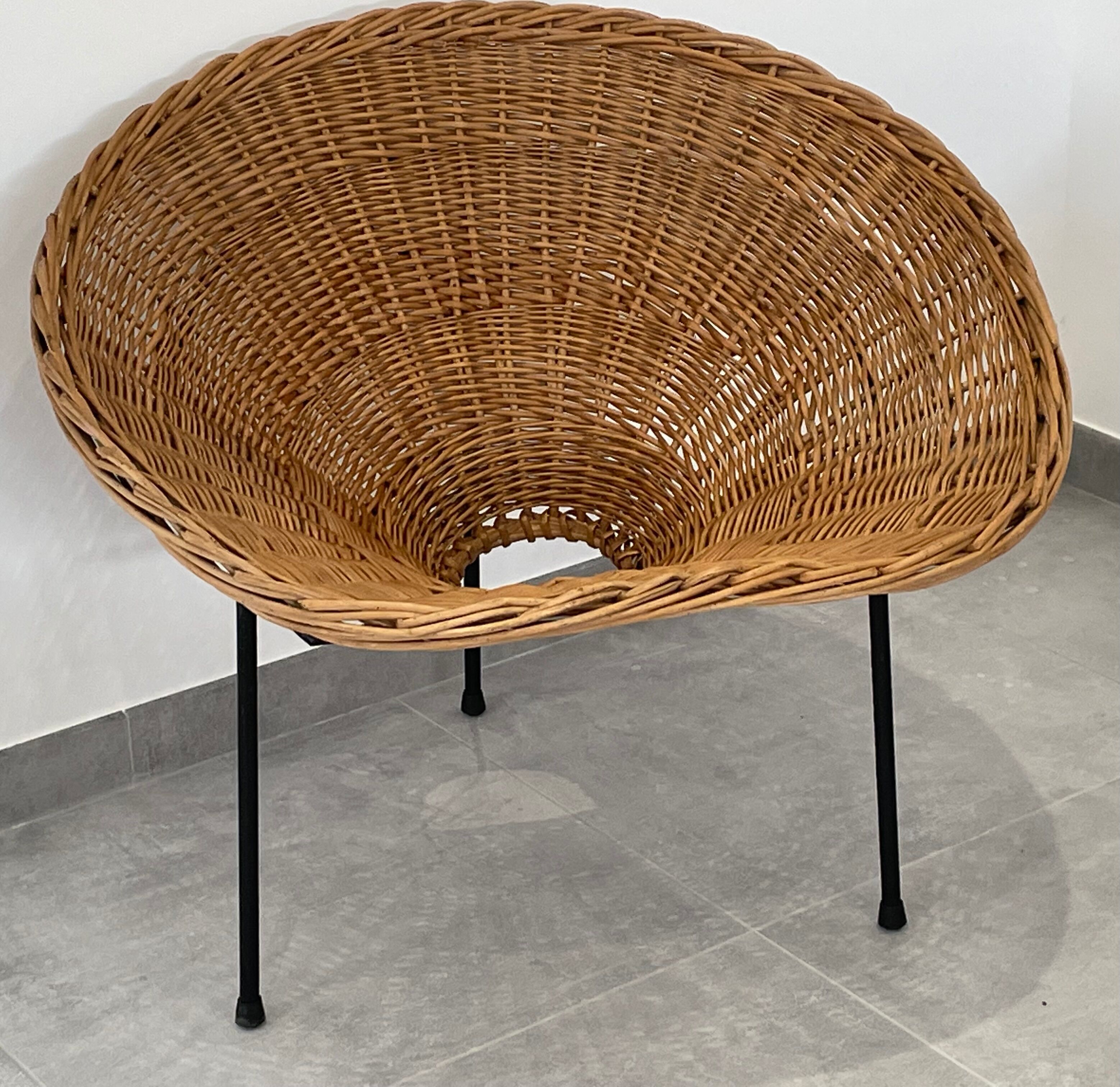 Pair of rattan and black metal armchairs, 1950s/60s