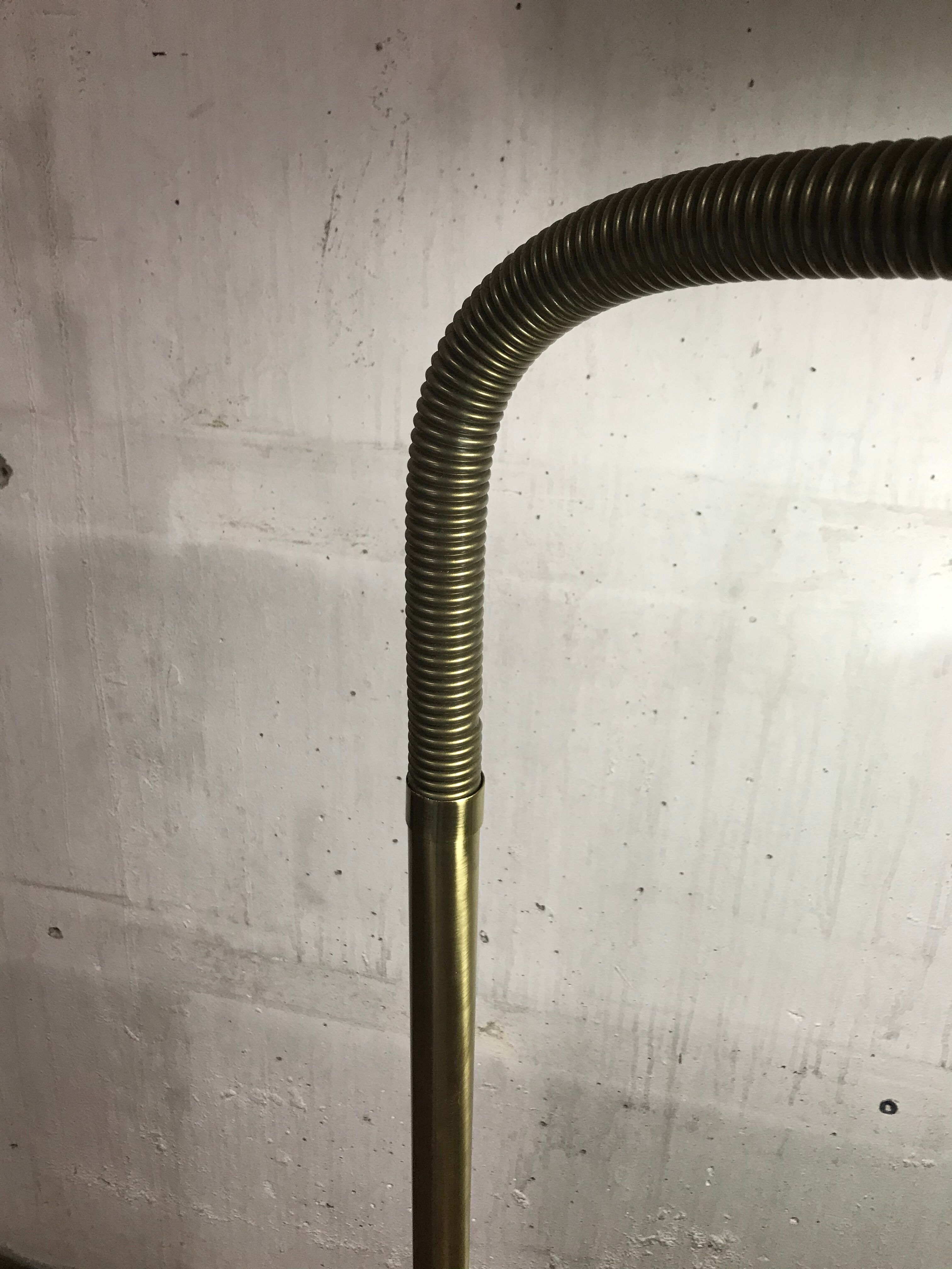 Golden articulated lamppost