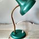 50's 50's green metal articulated desk lamp and golden flexible foot
