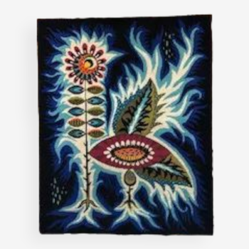 Tapestry "Flower and flame on a blue background"