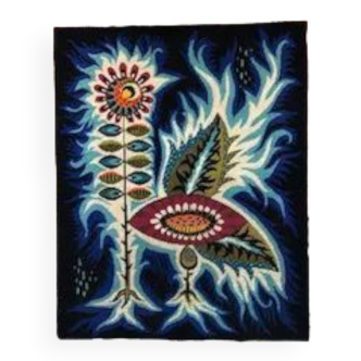 Tapestry "Flower and flame on a blue background"