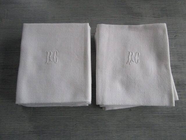 11 large old damask napkins, monogrammed