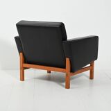 Swedish AB Futura teak and faux leather armchair