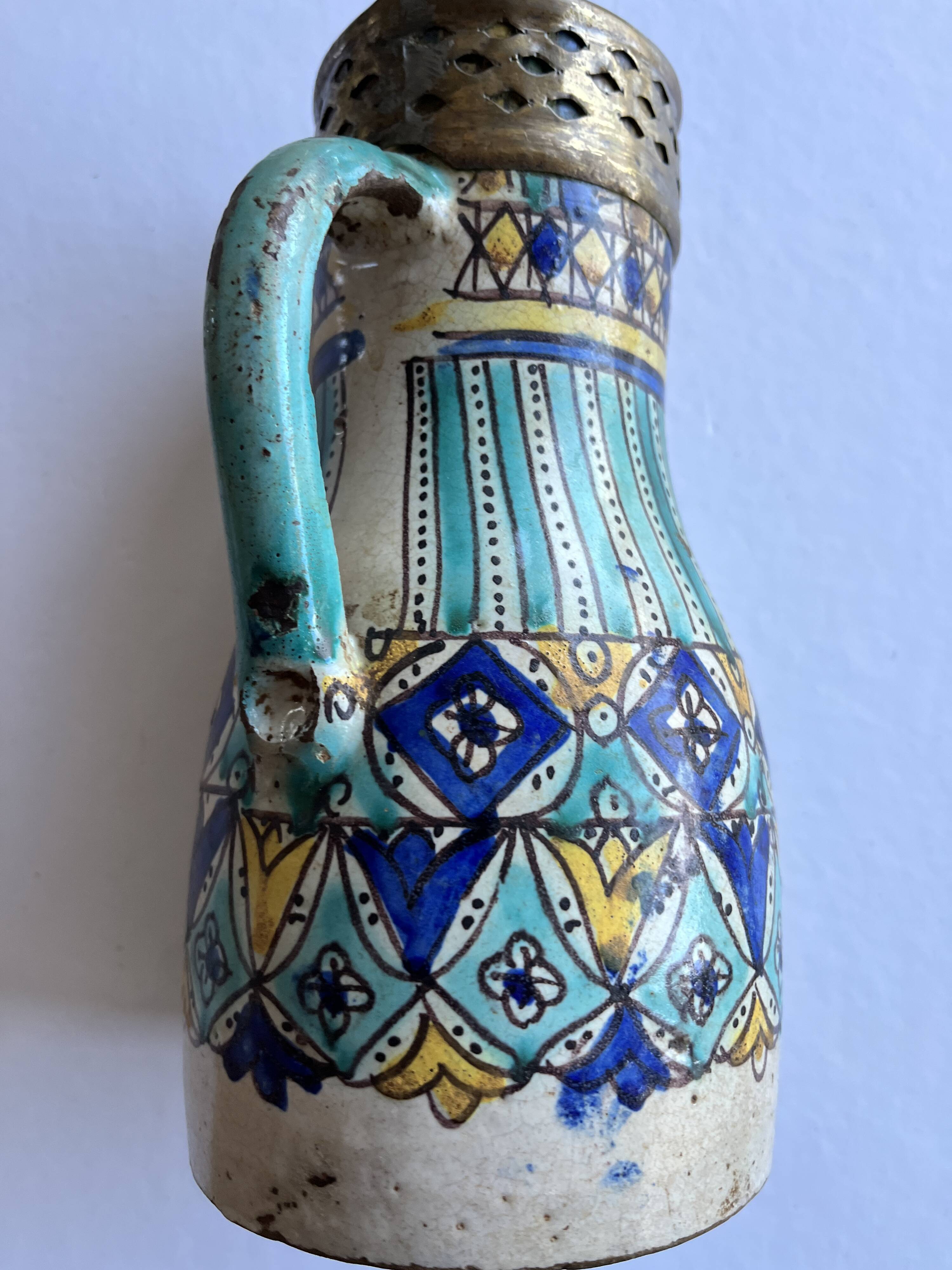 Fes, Morocco - Antique pitcher with copper rim