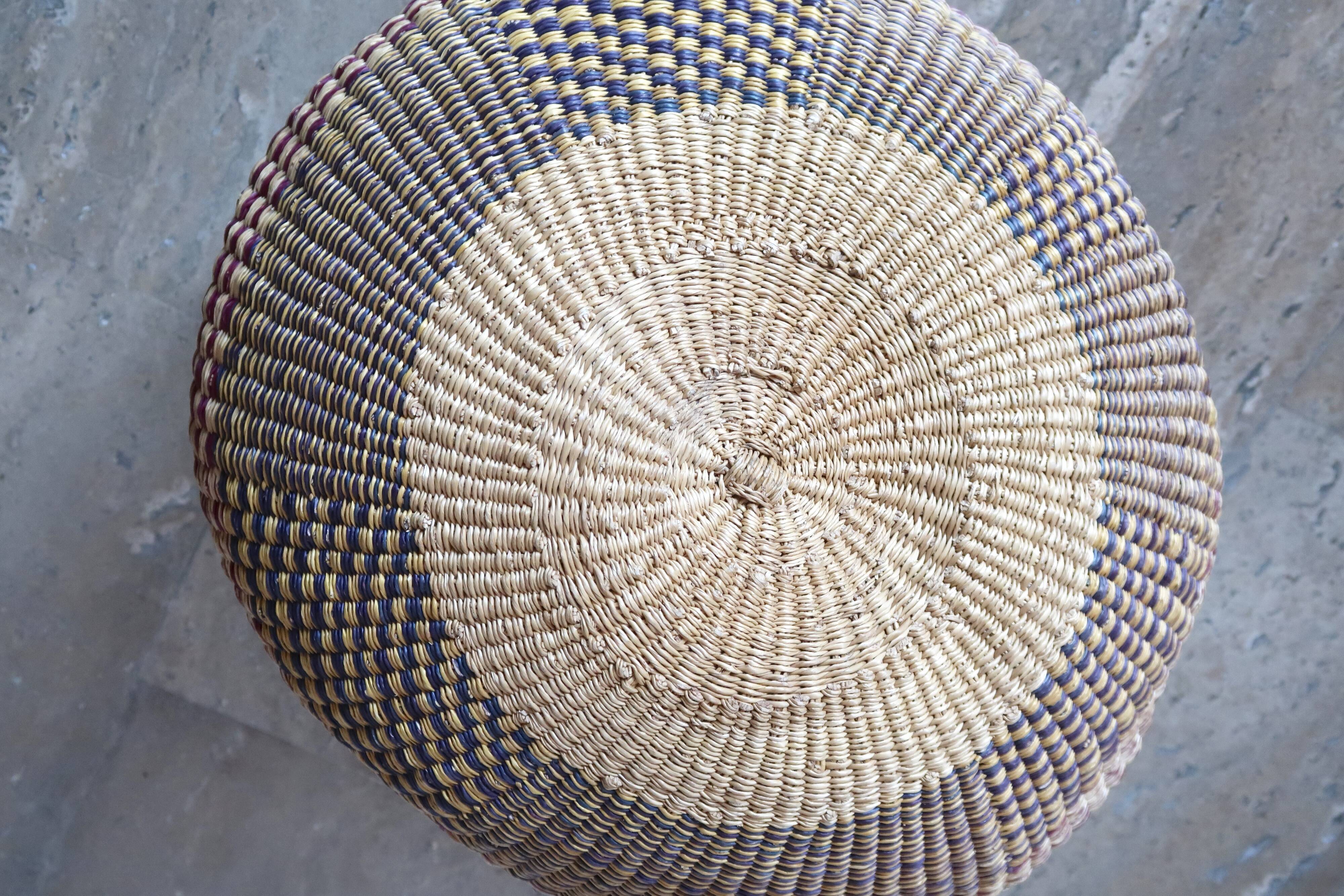 African braided basket, leather handle