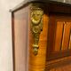 Inlaid chest of drawers with marble top
