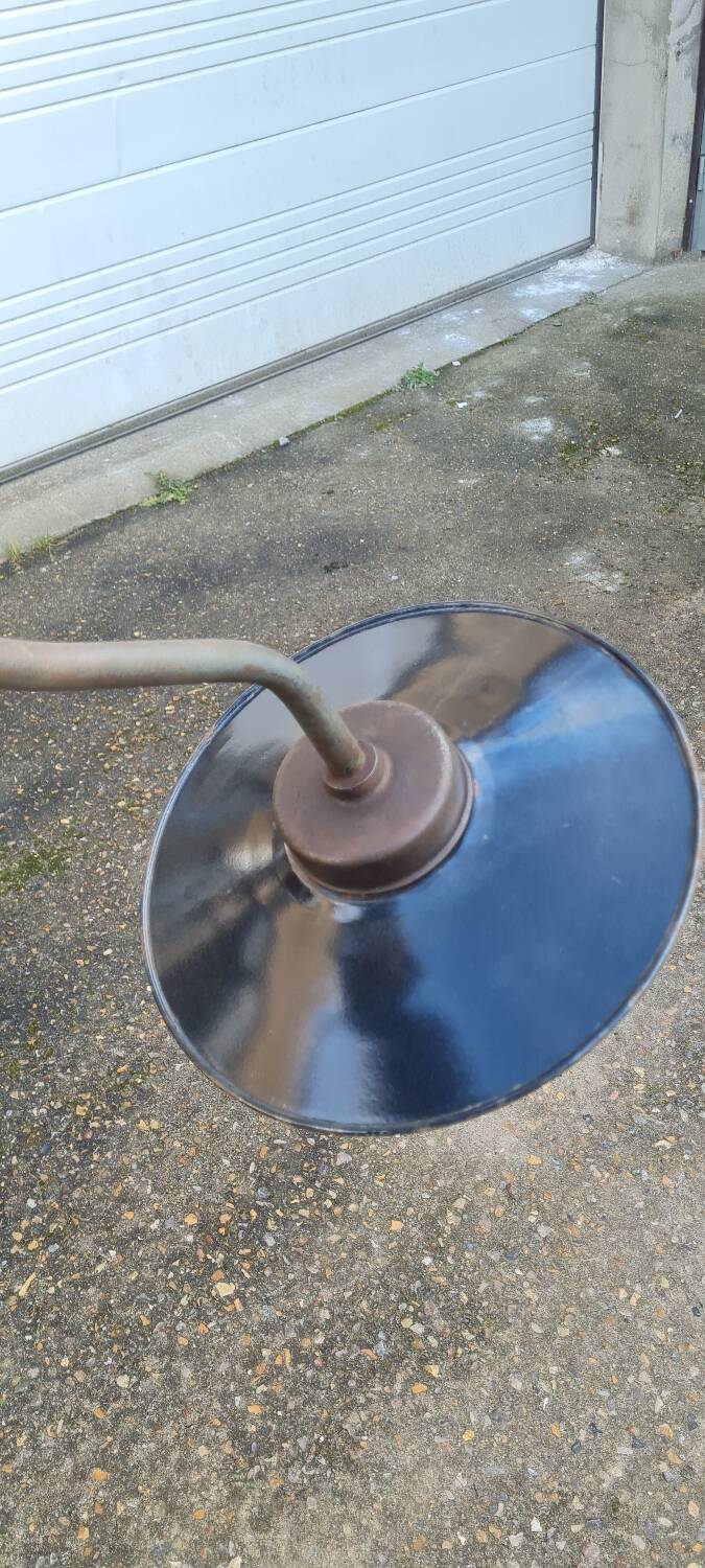 Exterior wall light in enamelled sheet metal