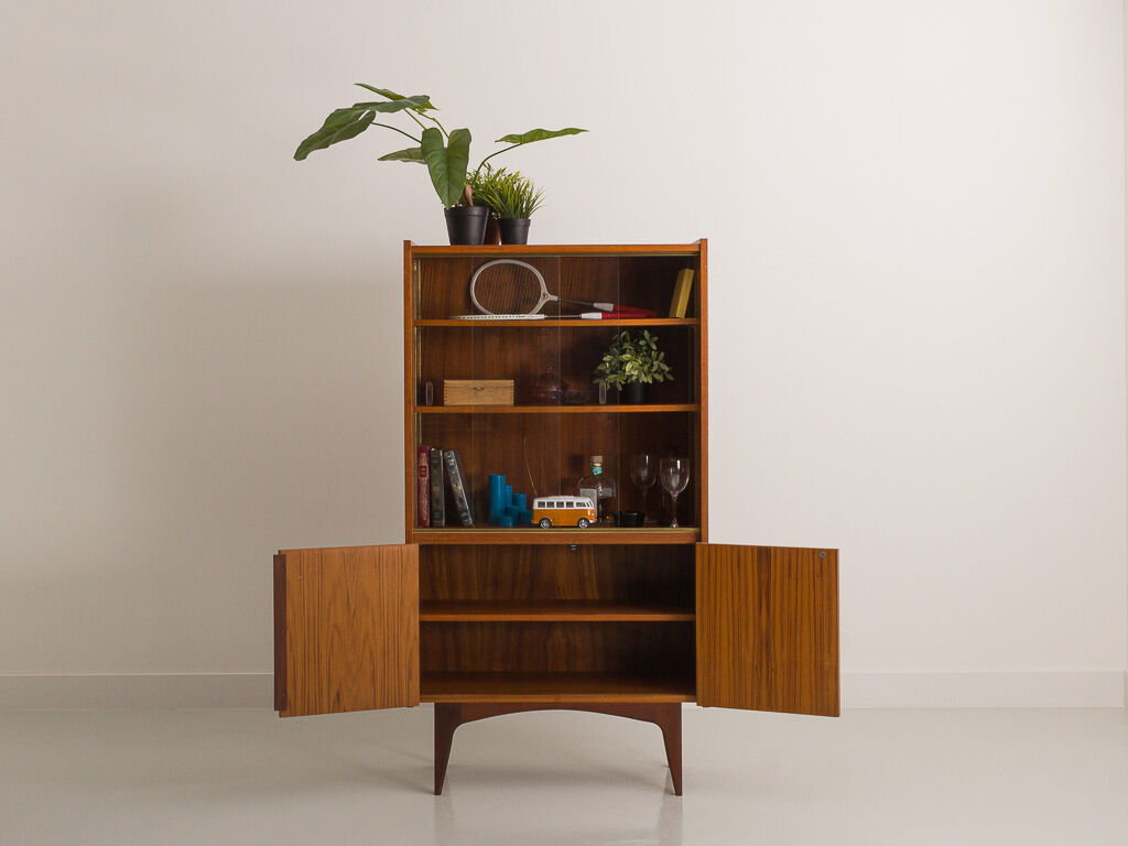 Teak sideboard consisting of a showcase with shelves and a double door