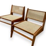 Pair of teak and canning armchairs