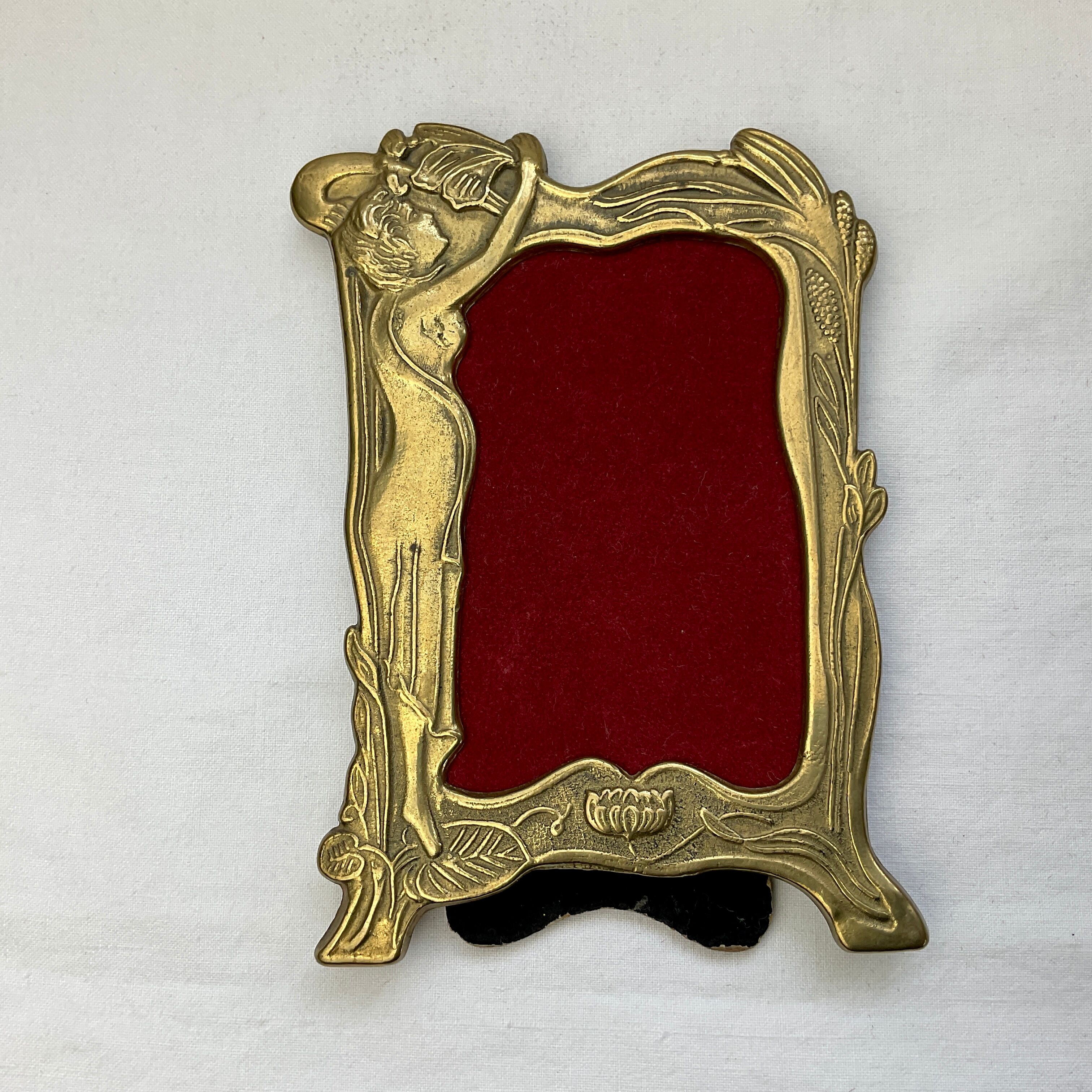 Pair of brass frames with Art Nouveau style woman