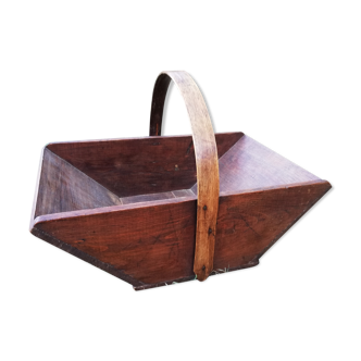 Basket of authentic antique wooden winemakers