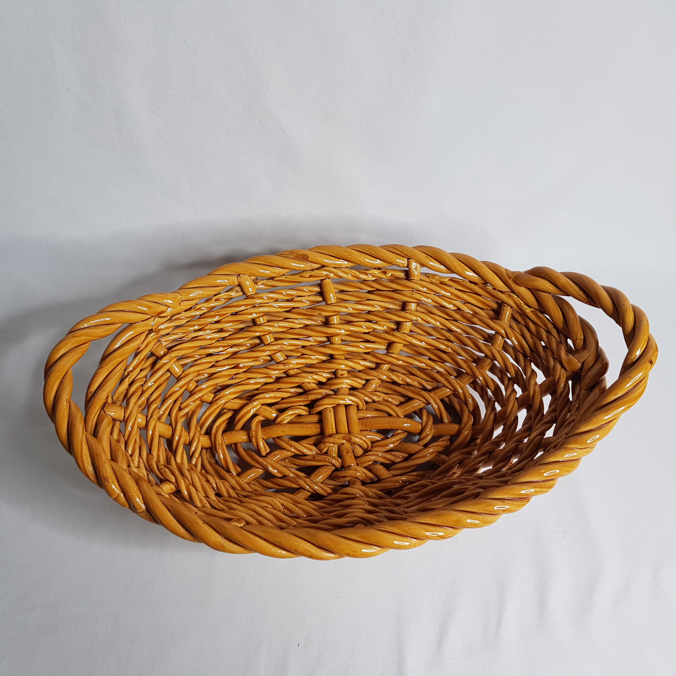 Fruit basket in golden yellow braided dab