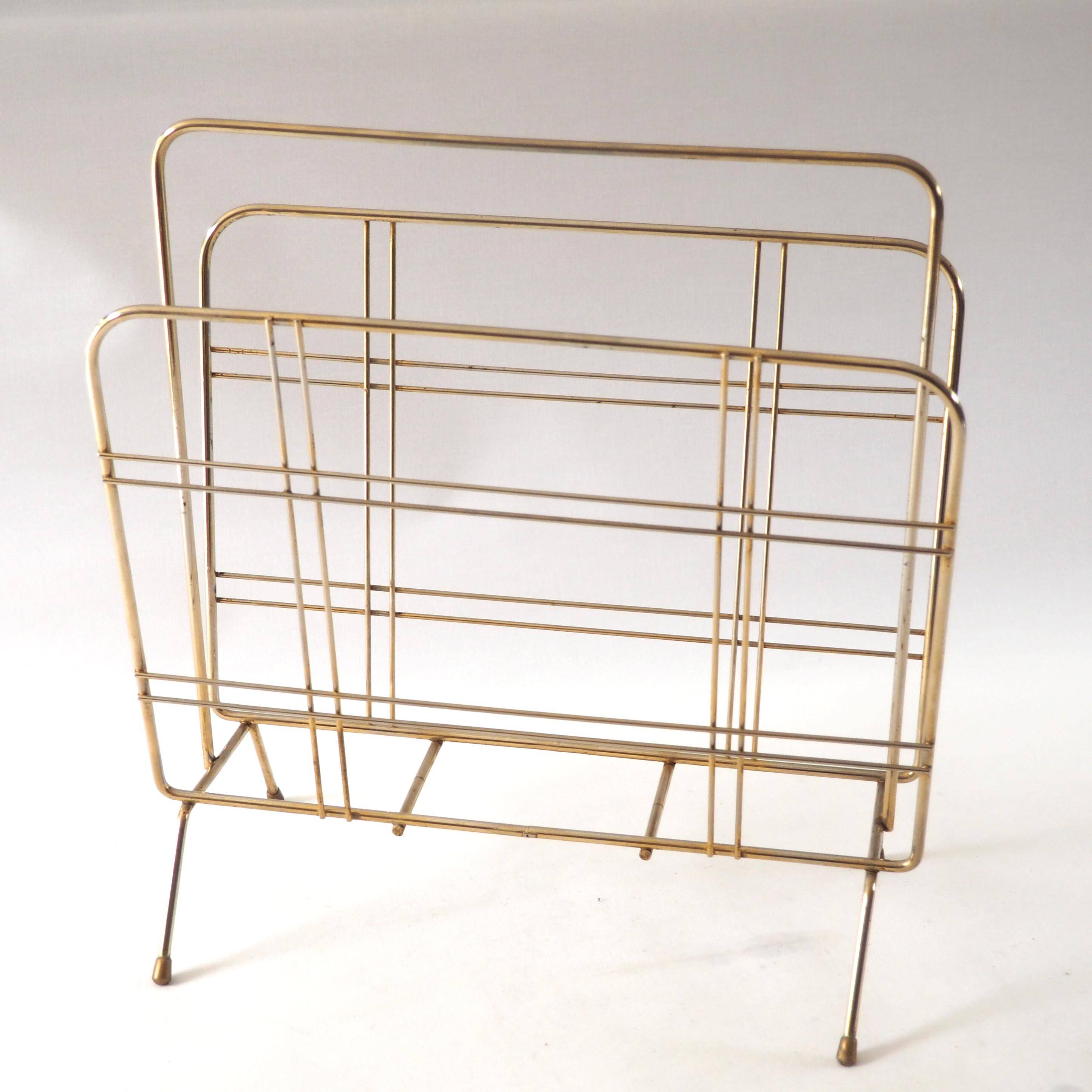 Gold metal magazine rack