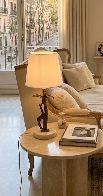 Bronze and marble lamp in Hollywood Regency style.
