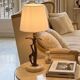 Bronze and marble lamp in Hollywood Regency style.