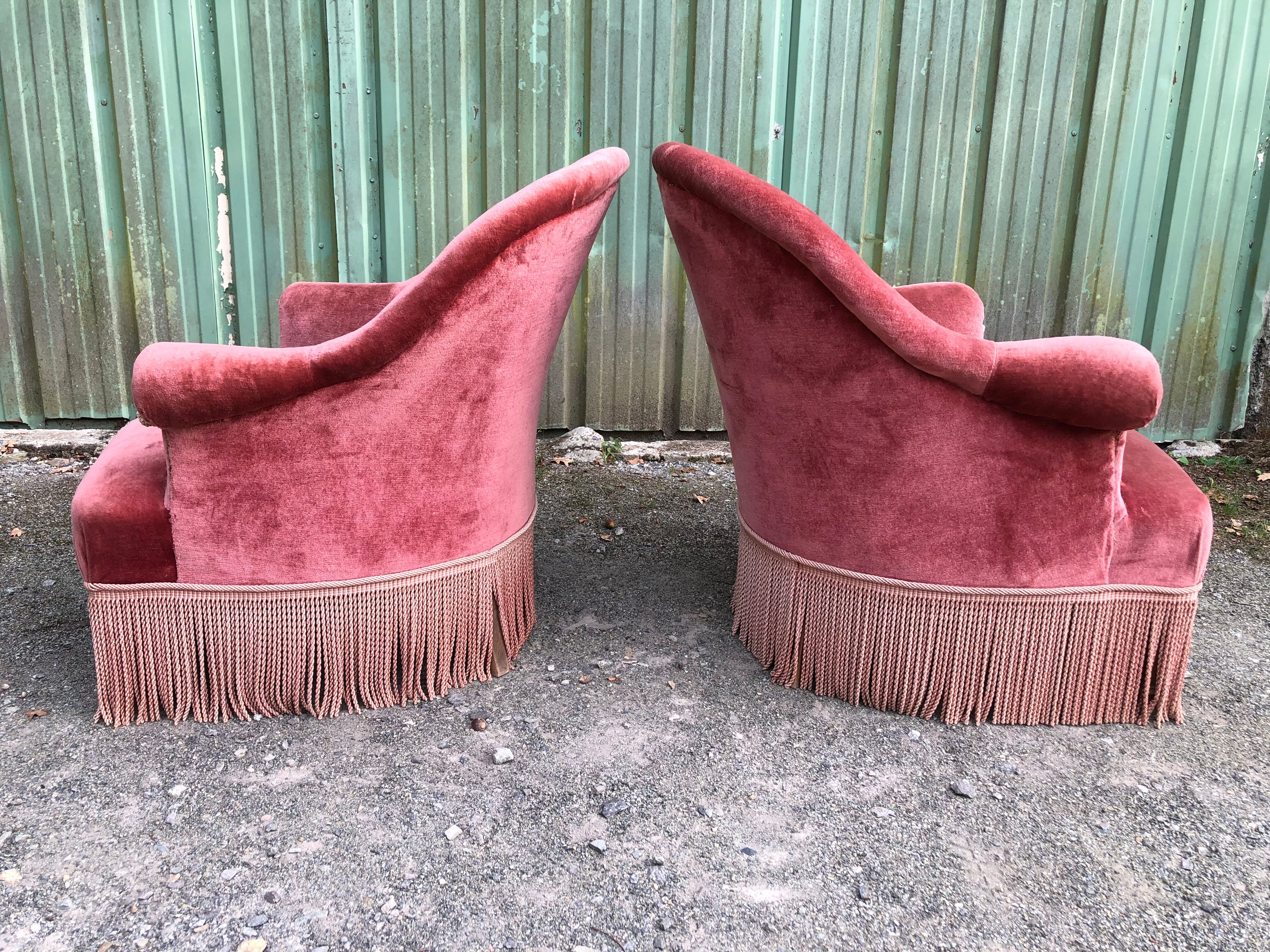 Duo de fauteuils vintage crapaud en velours saumon