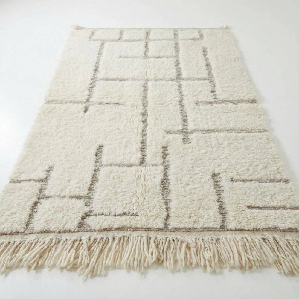 Moroccan rug with black graphic pattern