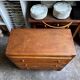 Dark wood 3-drawer chest of drawers