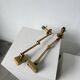 Pair of brass wall lights with articulated arms from the 70s