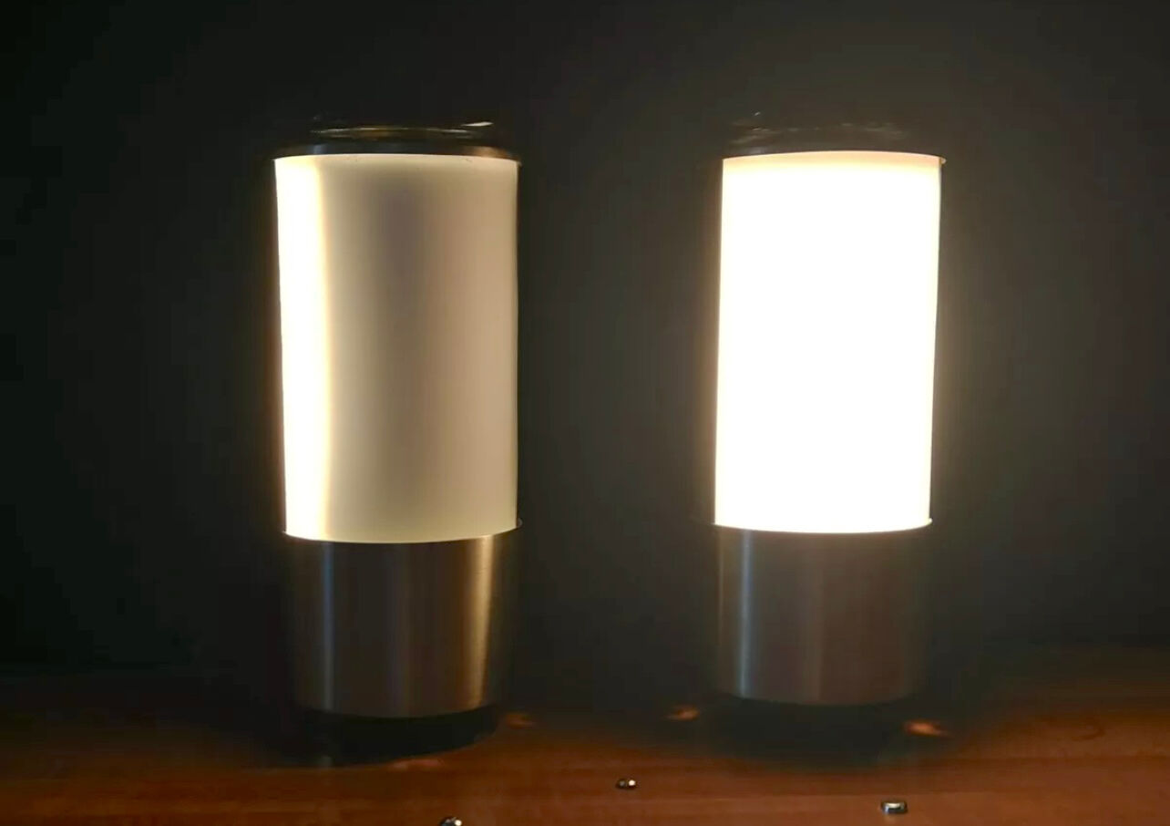 Mid-century modern pair of rare labeled Lumi Milano table lamps