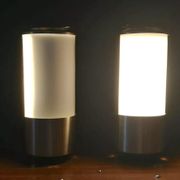 Mid-century modern pair of rare labeled Lumi Milano table lamps