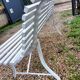 Old garden bench with metal legs and wooden slats
