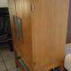 Bar cabinet opening with 2 doors from the 1950s.