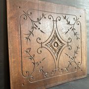 Pair of antique decorative panels in carved wood, late 19th century.