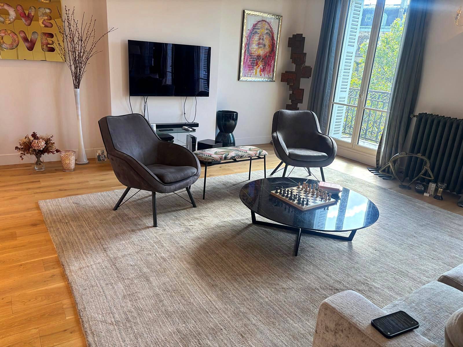 Pair of Joe PMP furniture armchairs in anthracite grey fabric.