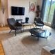 Pair of Joe PMP furniture armchairs in anthracite grey fabric.