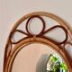 Arched Spanish wall mirror in rattan and bamboo, 1960s.
