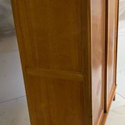 Vintage wardrobe with compass feet, sliding doors