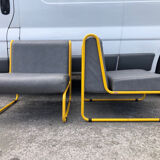 Pair of designer armchairs by Henri Julien