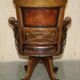Victorian captain's chair in leather restored by Cornelius V Smith.