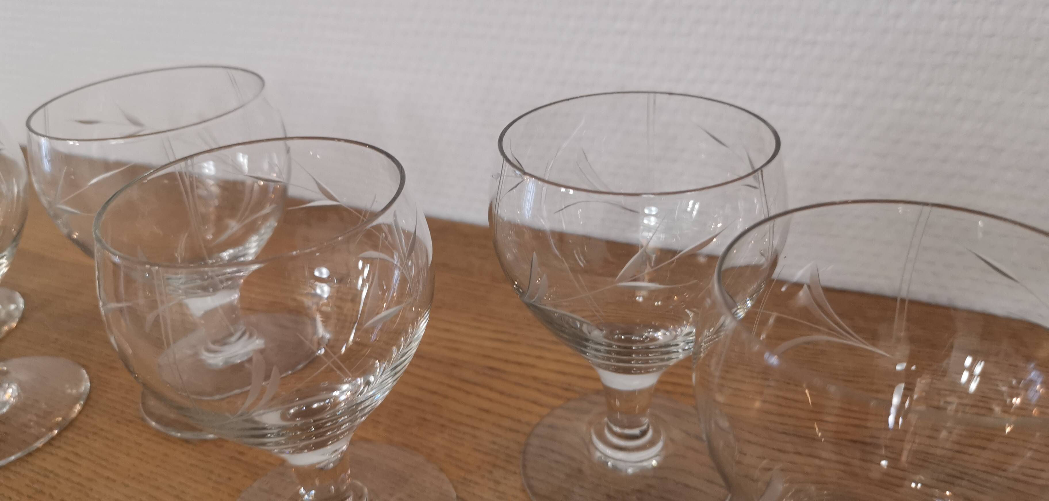 Set of 7 finely engraved vintage wine glasses