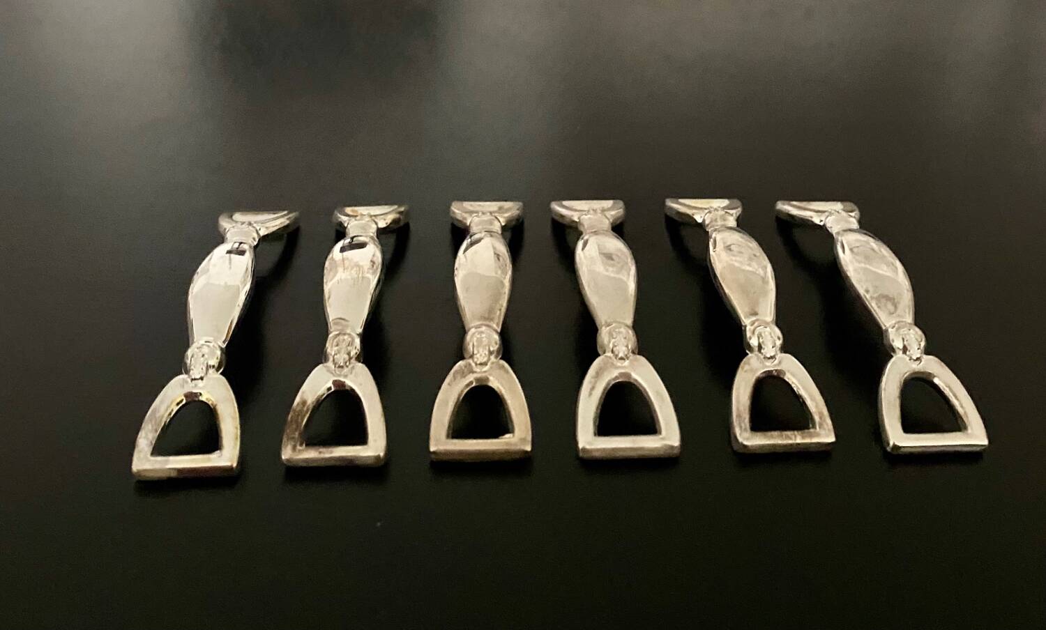 6 Silea knife holders in silver-colored metal stirrup shape